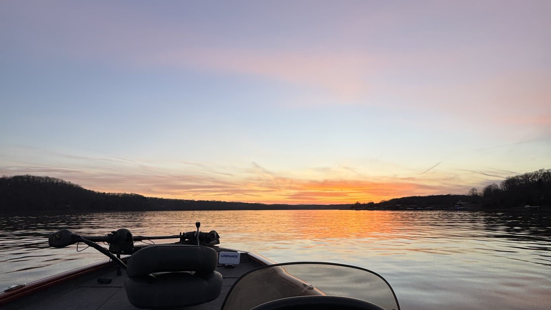 Sunset over Lake of the Ozarks from the bow of the Tracker Pro Team