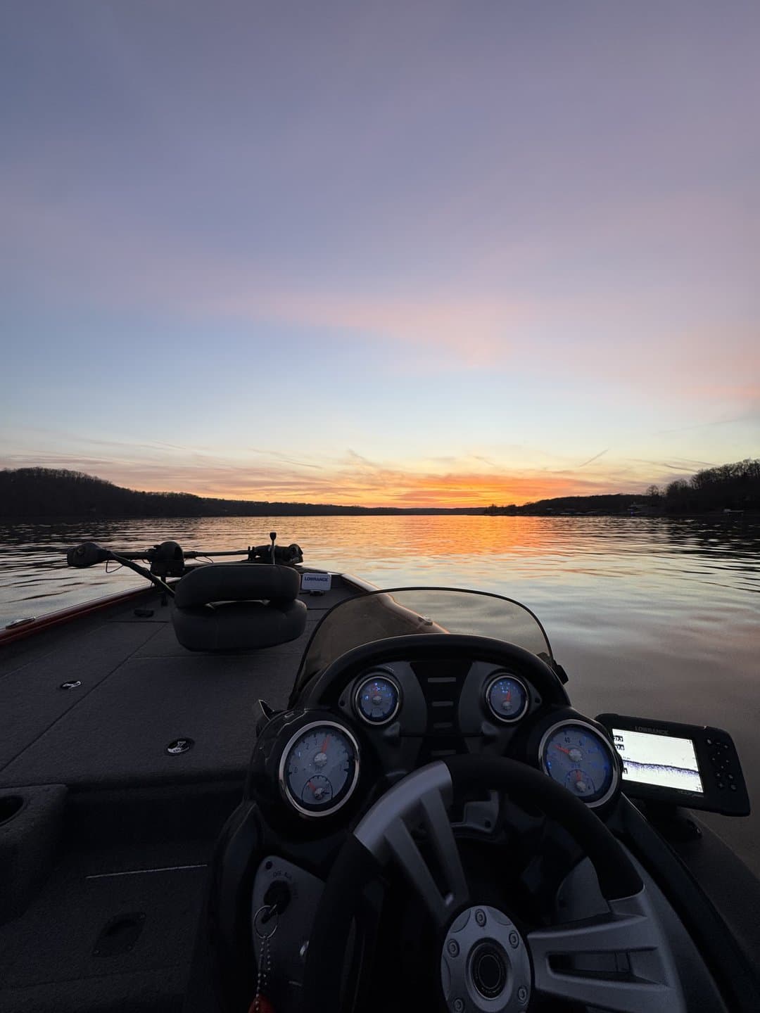 Sunset over Lake of the Ozarks from the bow of the Tracker Pro Team